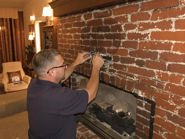 Rock Hill Chimney Sweep expert fixing a fireplace in Rock Hill, SC
